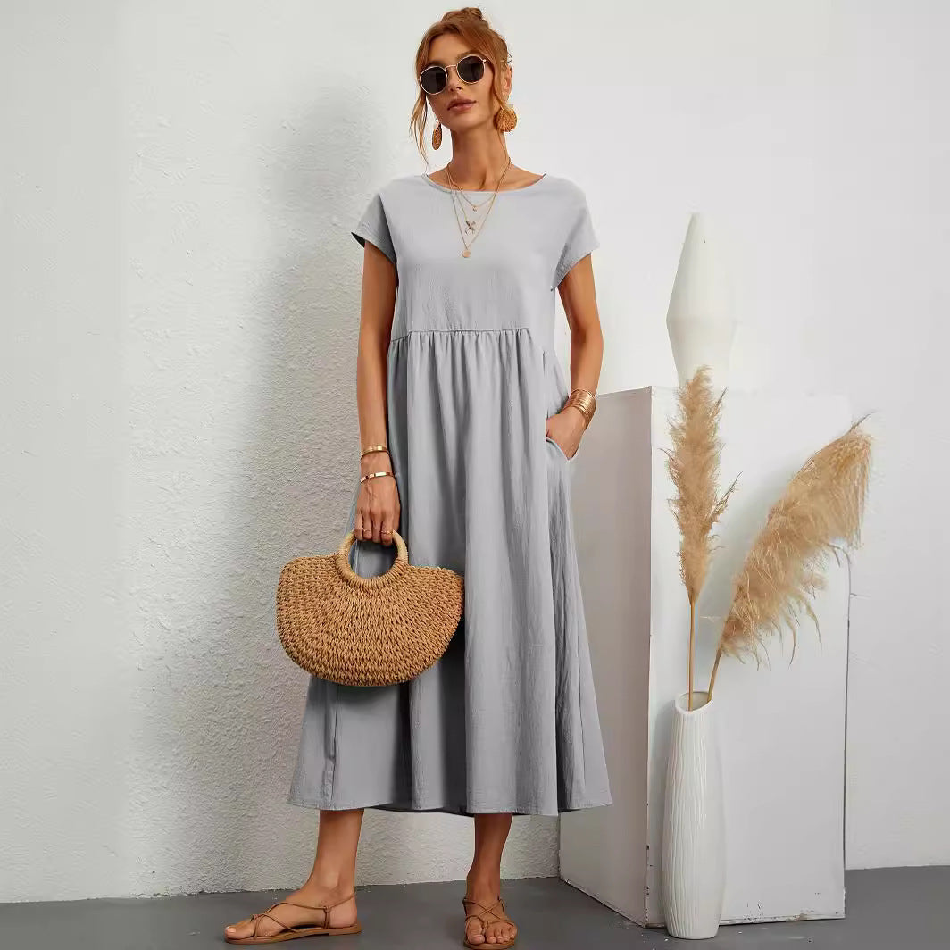 Robe longue fluide à manches courtes avec poches